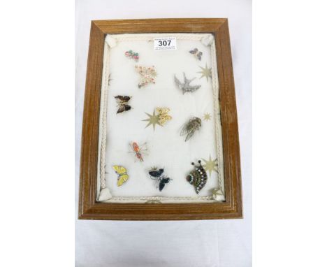 Display case containing vintage and modern brooches including silver &amp; enamel butterfly, bird, bee, snail etc
