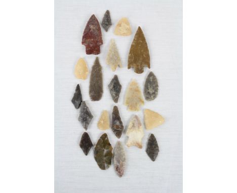 Cigar box containing a collection of vintage Stone Arrow Heads