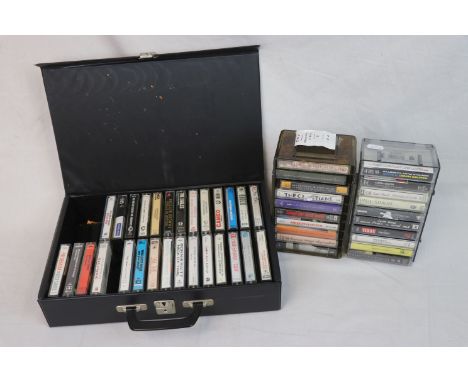 48 Cassette tapes to include Prince, Sting, Talking Heads, Jimi Hendrix, Bob Dylan etc, with one carry case