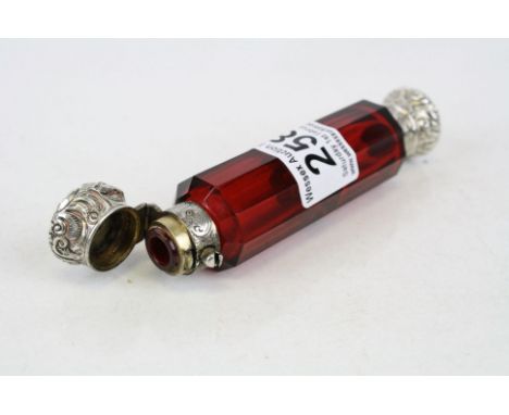 Double ended Ruby glass Scent bottle with Floral decorated white metal fittings, approx 12.5cm in length
