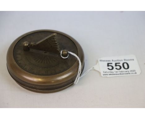 Brass cased sundial and compass