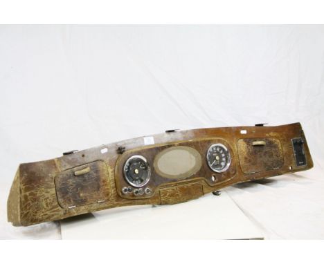 Vintage wooden car dash board with dials 