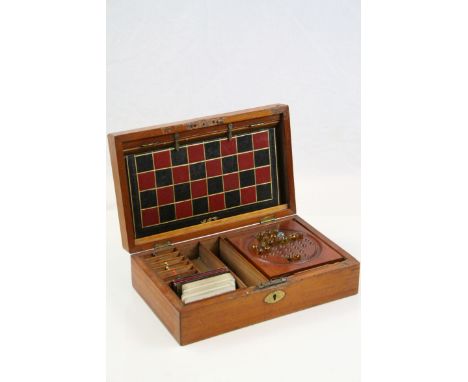 Victorian Mahogany Games Compendium Box, the hinged lid opening to reveal a fitted interior containing various games includin