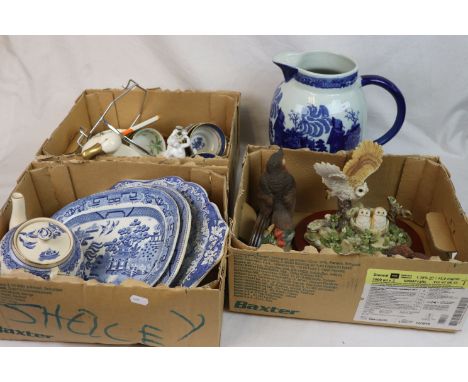 Quantity of blue and white cerramics, to include large jug, teapot, platters etc, a group of bird figurines, figures etc