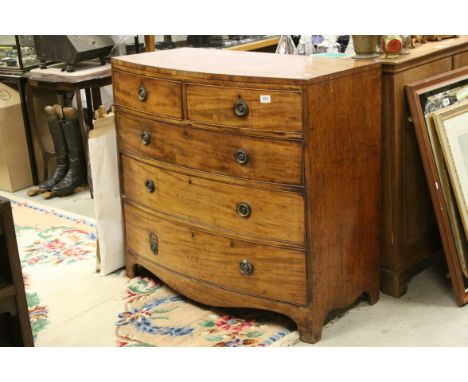 Early 19th century Mahogany Bow Fronted Chest of Two Short over Three Long Drawers with Brass Ring Handles and raised on Brac