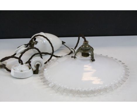 French rise and fall white glass light fitting with brass and porcelain fittings  