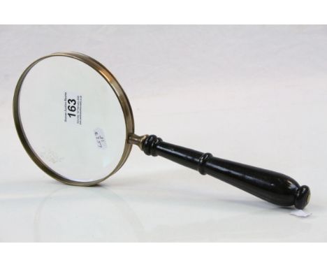 Vintage oversized magnifying glass with turned wooden handle 