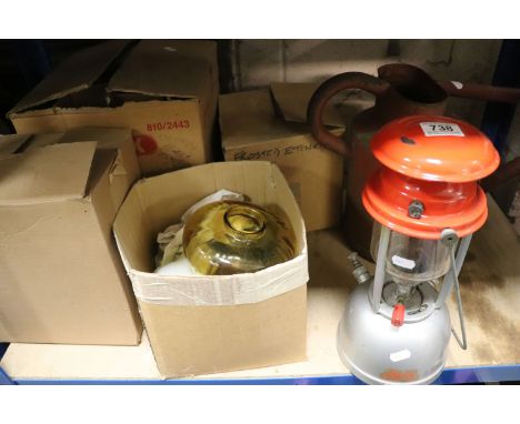 Late 20th century Hurricane paraffin lamp and a watering can
