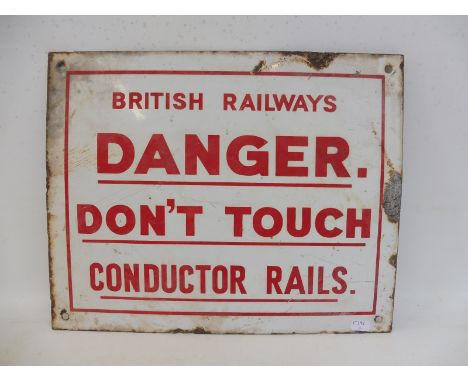 A British Railway 'Danger Don't Touch Conductor Rails' rectangular enamel sign, 12 1/2 x 10".