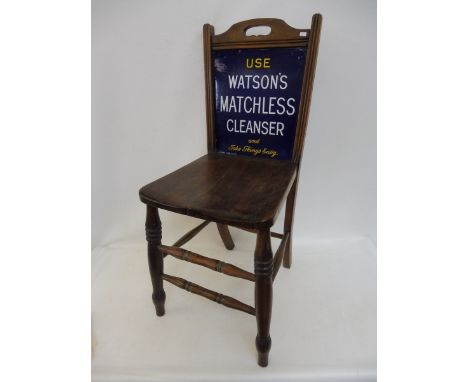 A rare department store chair with an inset double sided enamel sign to the back, one side advertising Watson's Matchless Cle