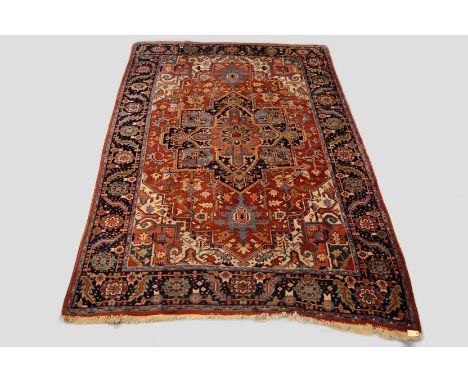 Good Heriz carpet, north west Persia, early 20th century, 11ft. 5in. x 7ft. 8in. 3.48m. x 2.34m. Slight wear in places; small