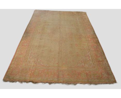 Borlu carpet, west Anatolia, late 19th/early 20th century, 14ft. 10in. x 10ft. 4in. 4.52m. x 3.15m. Overall wear; hole to bor