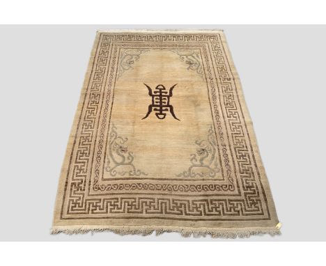 Tibetan cream field carpet, Inner Asia, circa 1950-60s, 10ft. 3in. x 6ft. 11in. 3.12m. x 2.11m. The cream wool field with nat