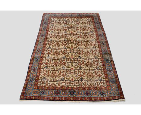 Qum ivory field carpet, south central Persia, mid-20th century, 11ft. 1in. x 7ft. 2in. 3.38m. x 2.18m. Crude repair and small