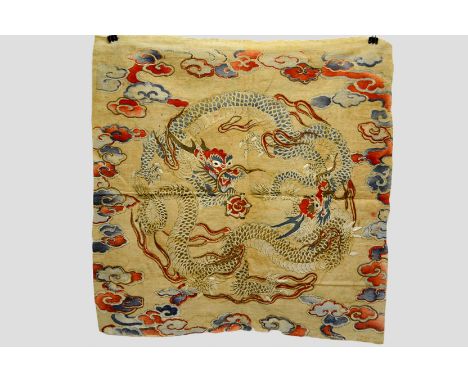Interesting Chinese fine cotton panel, decorated in blues, reds and whites with gold printed details throughout and couched t
