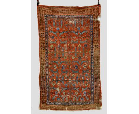 Interesting East Turkestan rug, possibly Kashgar, first half 19th century, 8ft. 9in. x 5ft. 3in. 2.67m. x 1.60m. Overall wear