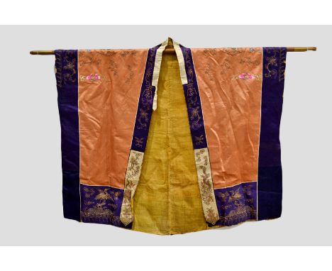 Taoist Priest’s apricot silk robe, China, 19th century, richly embroidered in floss silks and metal threads with dragons chas