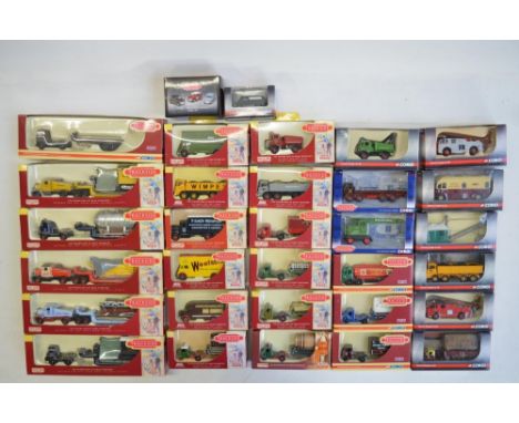 Thirty two boxed 1/76 scale OO gauge diecast Trackside model vehicles/vehicle sets from Corgi and Lledo to include Corgi CR50