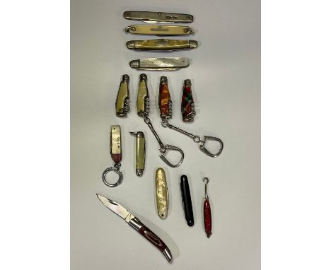 Collection of miniature knifes with various handles, including silver fruit knife, “bottle” knifes and button pull. (14) 