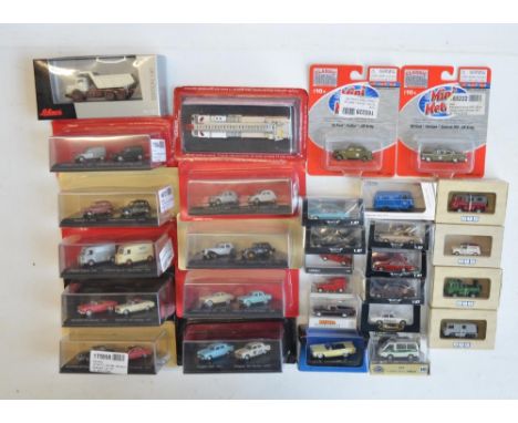 Twenty eight boxed diecast 1/87 scale OO gauge vehicle models from BUB, Brekina, Schuco, Norev, Neo, TomyTec Ricko, Atlas Edi