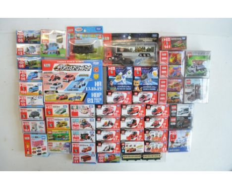 Fifty boxed Japanese imported small scale Takara Tomy diecast models to include TV/film related models (Transformers, Marvel,