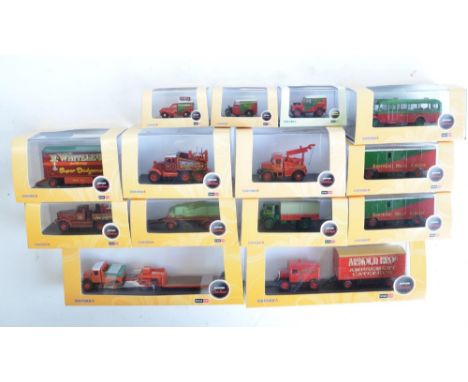 Fourteen boxed 1/76 scale OO gauge diecast vehicle models from Oxford Diecast Showtime range to include Arnold Bros, Pat Coll