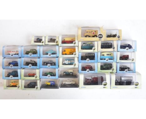 Thirty two 1/76 scale OO gauge diecast vehicle models from Oxford Diecast to include Commercial, military and Automobile Comp