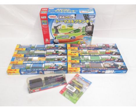 Thomas the Tank Engine - Takara TOMY boxed and cased trains and carriages (9), a boxed track set and a Fisher Price Hank mode