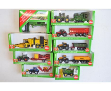 Nine boxed 1/87 scale (HO gauge) diecast farming models from Siku to include 1876 John Deere combine harvester, 1856 John Dee