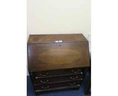 A GEORGIAN STYLE MAHOGANY AND MARQUETRY INLAID BUREAU the rectangular top above a fall front opening to reveal an arrangement