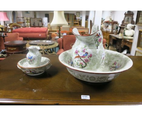 A COPELAND SPODE TRANSFER DECORATED TOILETRY SET comprising a wash basin, water jug, soap dish and vase (4) the white ground 