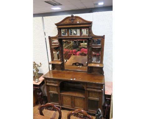 AN EDWARDIAN ROSEWOOD AND MARQUETRY INLAID SIDE CABINET the raised superstructure headed by a scroll cartouche terminating in