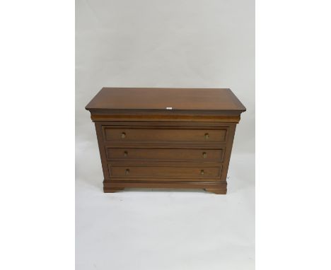 A GEORGIAN STYLE MAHOGANY CHEST OF DRAWERS the rectangular top above a shaped frieze drawer with a further three long drawers