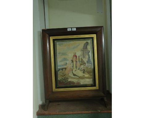 A ROSEWOOD FRAMED FIRESCREEN, c.1900, with tapestry insert depicting an Asian Prince80cms x 62cms.