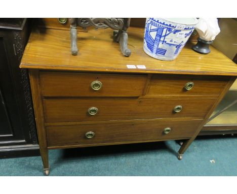 AN EDWARDIAN MAHOGANY AND MARQUETRY INLAID DRESSING TABLE the raised superstructure with an oval bevelled plate between taper