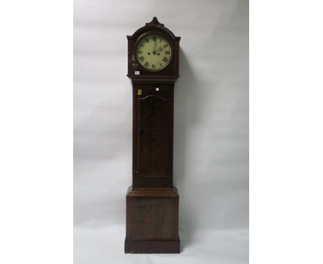 A MAHOGANY CASED CLOCK the rectangular top headed by a gadrooned rim with white dial and black painted numerals above the tru