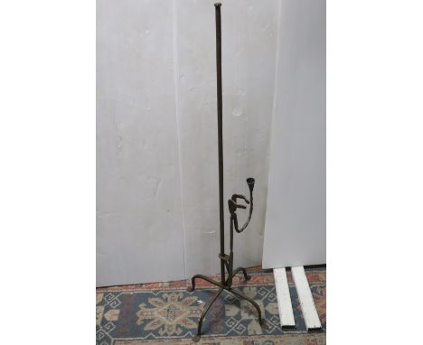 A WROUGHT IRON RUSH LIGHT