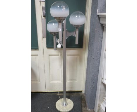 A FLOOR LAMP DESIGNED BY GAETANO SCIOLARI and produced in the 1960's It features three spherical lights at different heights 
