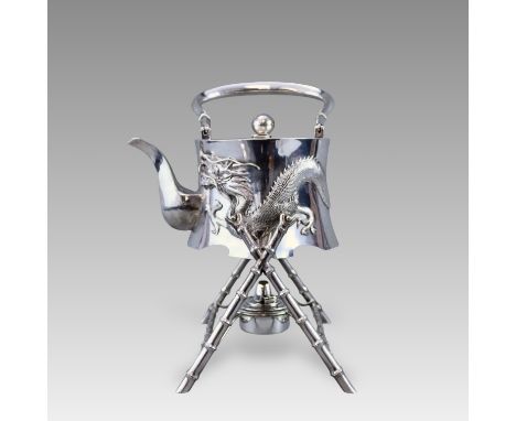 The kettle of rhomboid section with upright swing handle, carved around the waist with a fierce dragon en repousse, the stand