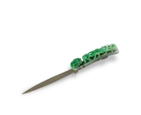 well carved with snarling dragon head hook facing a chilong in pierced relief, both carved using a stronger apple green inclu