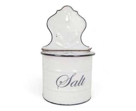 A vintage white enamel salt box - wall hanging with a bow fronted lidded container, 26cm high.
