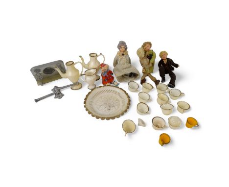 A 'Grecon' family group - comprising mother, father, two children and a grandmother, three with trade labels, together with a