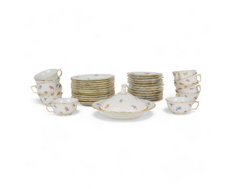 A mid 20th century Meissen tea service - white and decorated with floral sprigs, for twelve place settings comprising cups, s