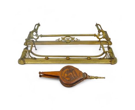 Two brass fenders - largest width 130cm, depth 28cm, together with a pair of wooden bellows carved with a portrait of Charles