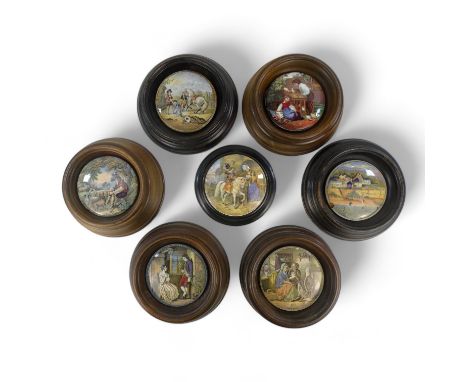 A 19th century Prattware pot lid - view of Pegwell Bay, 10cm diameter, within a wooden frame, together with six other Prattwa