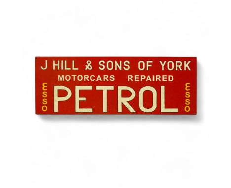 A metal painted advertising sign - for J Hill &amp; Sons of York, 'Esso Petrol Motorcars Repaired', 31 x 86cm.