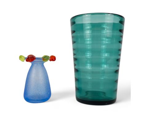 A Whitefriars tumbler vase - William Wilson Optic Rib design in a green colour, 20cm high, together with another art glass va