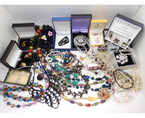 A collection of vintage costume jewellery to include items by Miracle etc Condition Report:No condition report available.