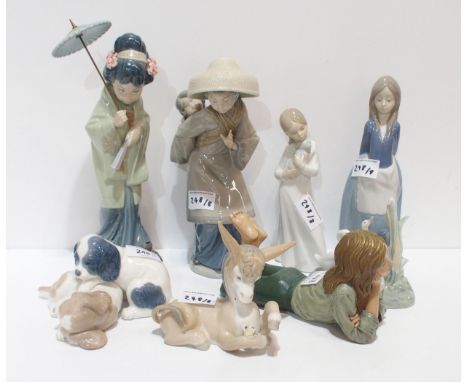 A collection of Lladro and Nao figures including a Geisha, Mother carrying child on back, a Donkey etc Condition Report:Avail