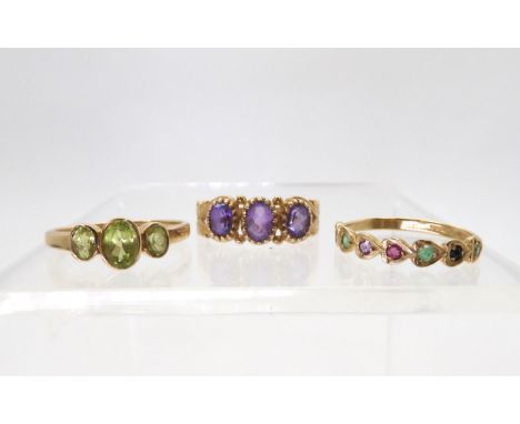 Three 9ct gold rings, 'Dearest' ring size O1/2, peridot size P1/2, amethyst size P, weight together 5.2gms Condition Report:A